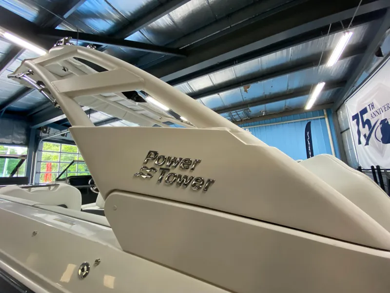 Slide: The Image of 2025 Regal LX6 boat with Power Tower feature in showroom. - 18