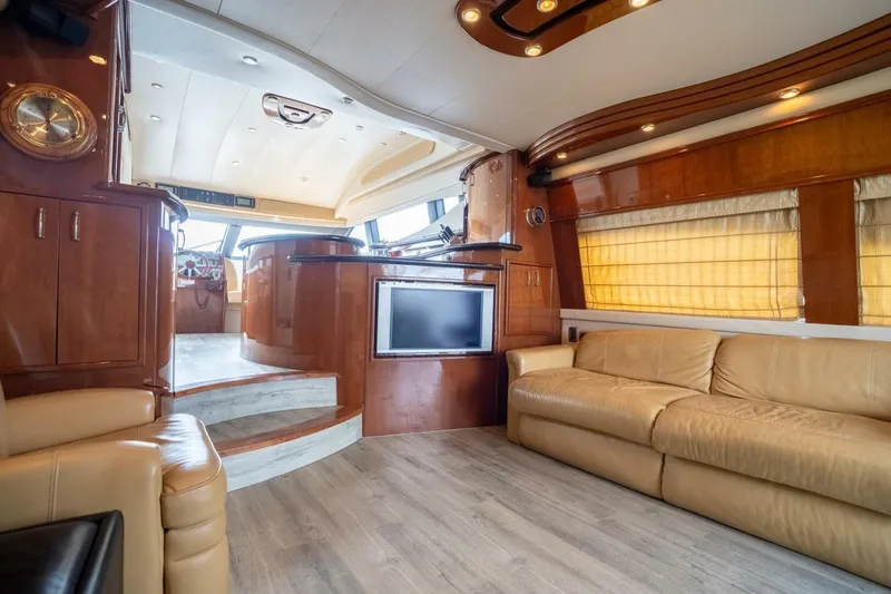 Slide: The Image of Luxurious 2006 Marquis 59 yacht interior with leather seating, wood accents, and modern amenities. - 22
