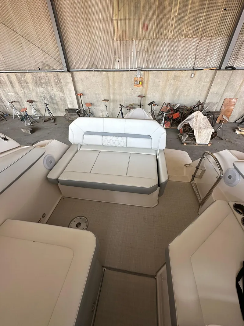 Slide: The Image of 2025 Regal 26XO boat interior with spacious seating in a storage area. - 9