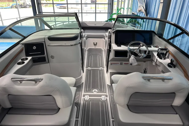 Slide: The Image of 2026 Regal LX9 boat interior with modern dashboard and luxurious seating. - 11