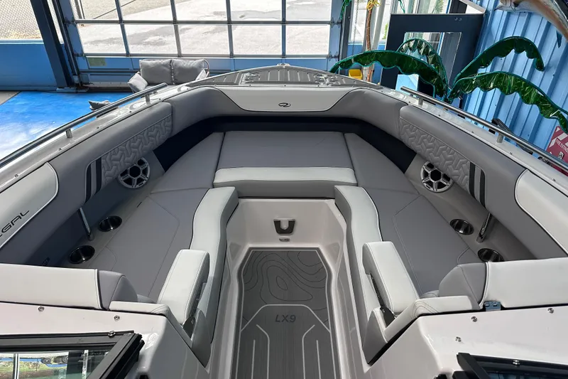 Slide: The Image of Luxurious 2026 Regal LX9 boat interior with sleek seating and modern design. - 18
