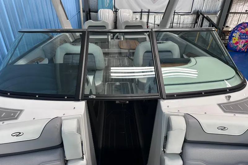 Slide: The Image of 2026 Regal LX9 boat interior with sleek seating and modern design. - 25