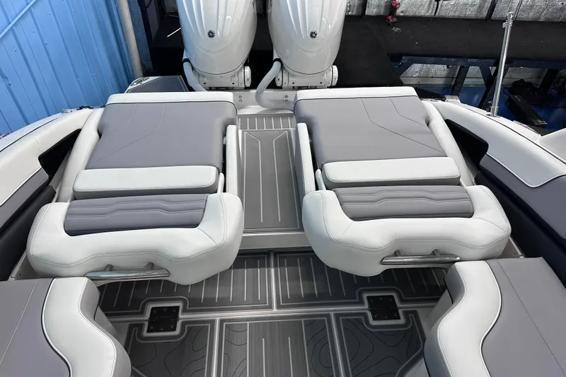 Slide: The Image of Luxury seating on 2026 Regal LX9 boat with sleek gray and white design. - 7