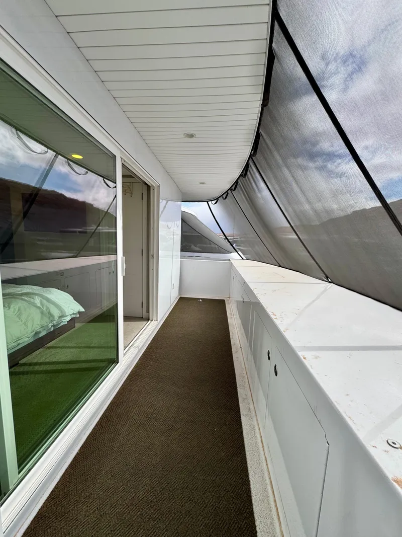 Slide: The Image of Modern balcony on Adonia Pace Trip #7, 2021, with glass doors and scenic views. - 28