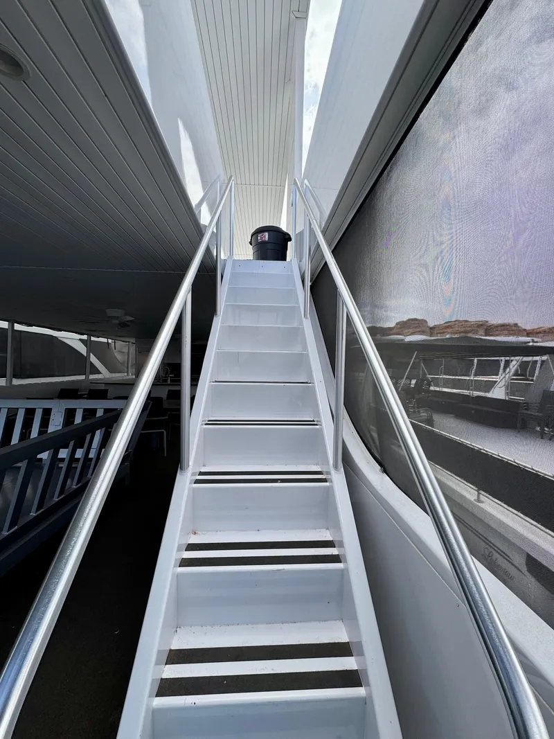 Slide: The Image of Staircase on Adonia Pace Trip #7 yacht, 2021 model, with sleek white design. - 30