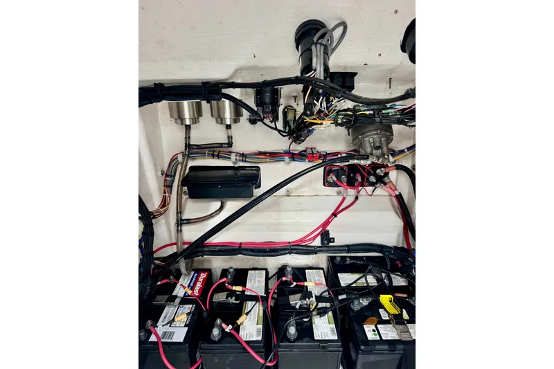 Slide: The Image of Electrical system of 2023 BlackJack 256 Bay boat with batteries and wiring. - 13