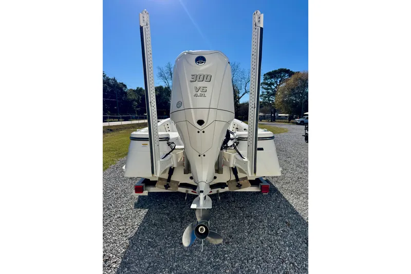 Slide: The Image of 2023 BlackJack 256 Bay boat with powerful 300 V6 outboard engine. - 5