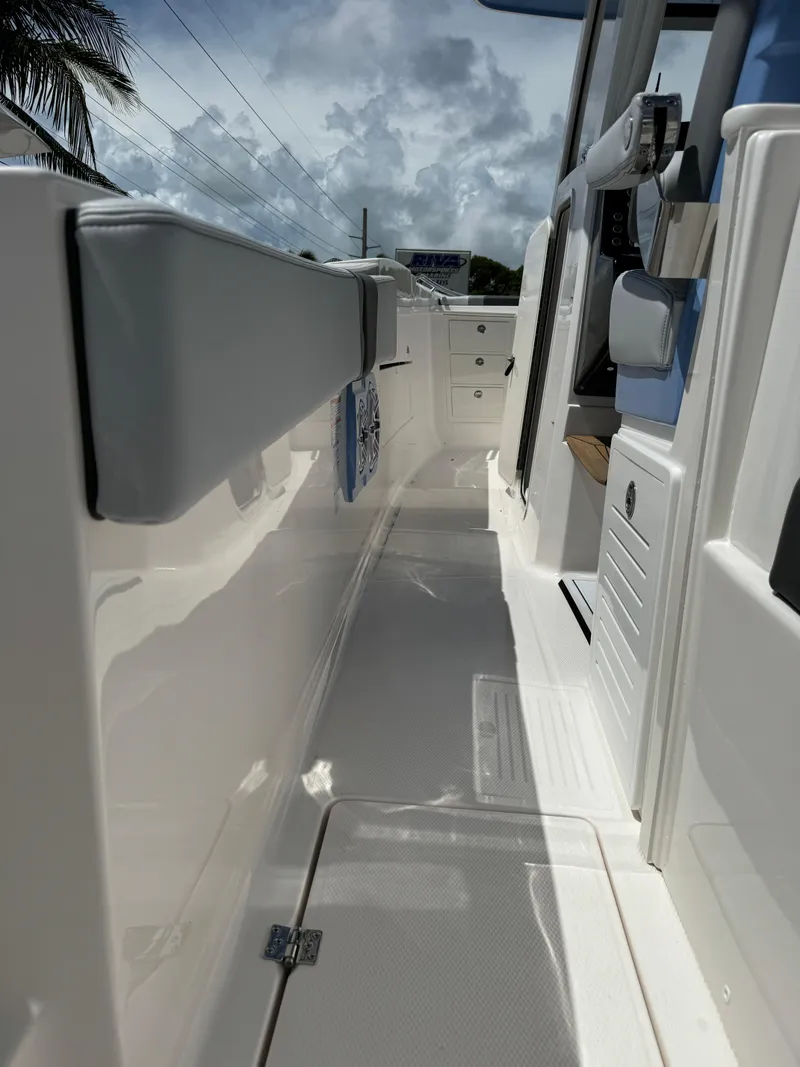 Slide: The Image of 2025 Robalo R360 Center Console boat interior with sleek design and modern features. - 14