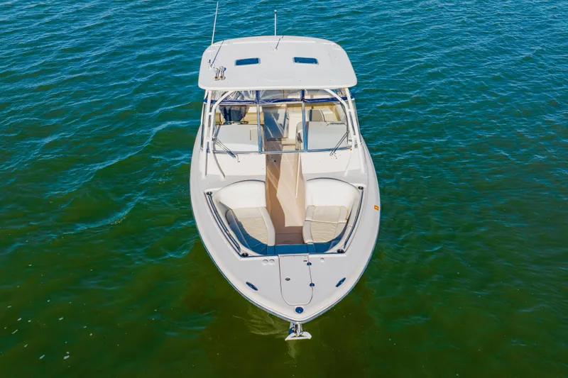 Slide: The Image of 2013 Grady-White Freedom 335 boat on calm water, aerial view. - 11