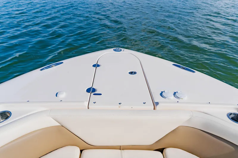 Slide: The Image of Bow view of 2013 Grady-White Freedom 335 boat on water. - 48