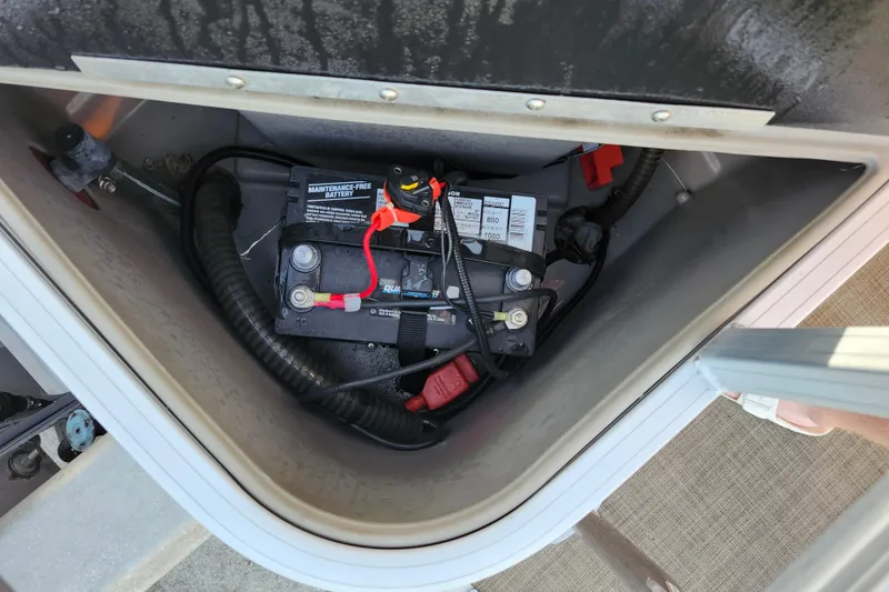 Slide: The Image of Battery compartment of 2023 Sun Tracker Bass Buggy 18 DLX boat. - 12