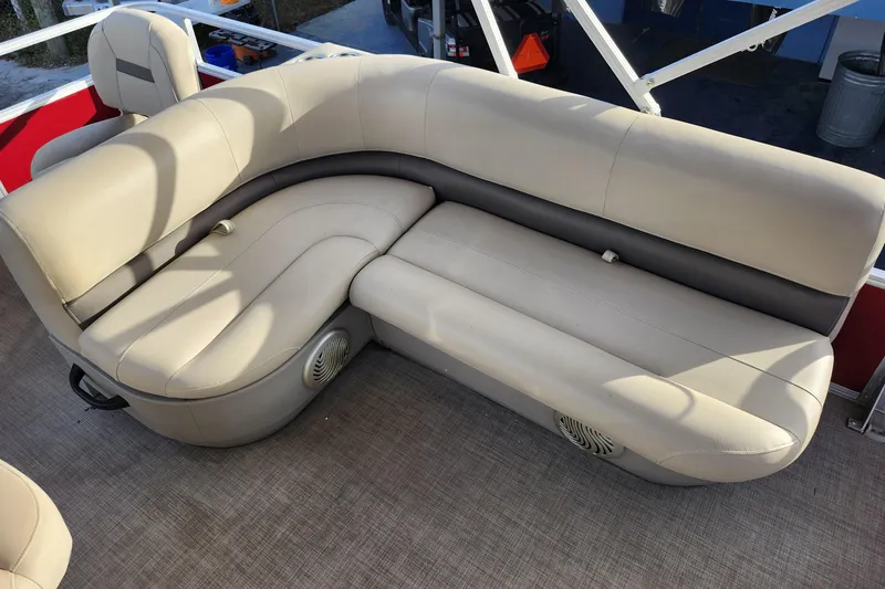 Slide: The Image of 2023 Sun Tracker Bass Buggy 18 DLX pontoon boat seating, beige upholstery, spacious and comfortable. - 16