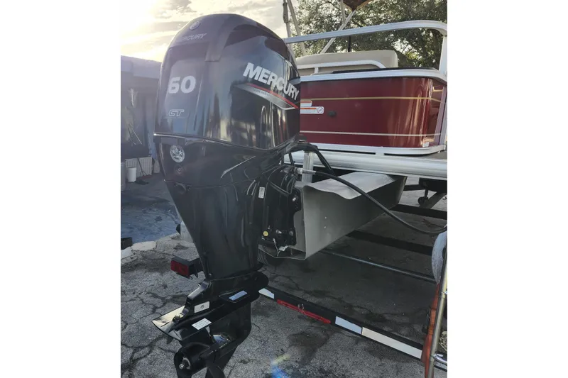 Slide: The Image of 2023 Sun Tracker Bass Buggy 18 DLX with Mercury 60 HP outboard motor. - 31