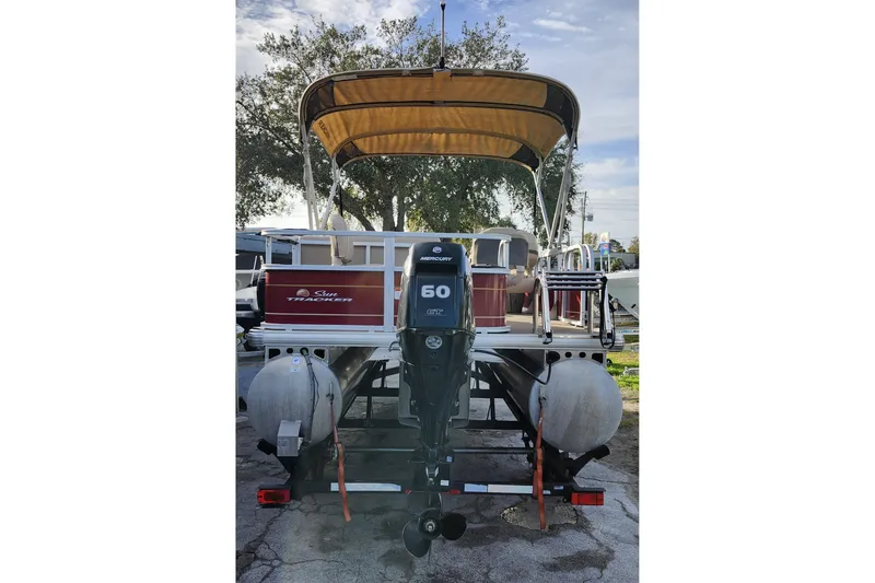 Slide: The Image of 2023 Sun Tracker Bass Buggy 18 DLX pontoon boat with Mercury 50 HP engine. - 5