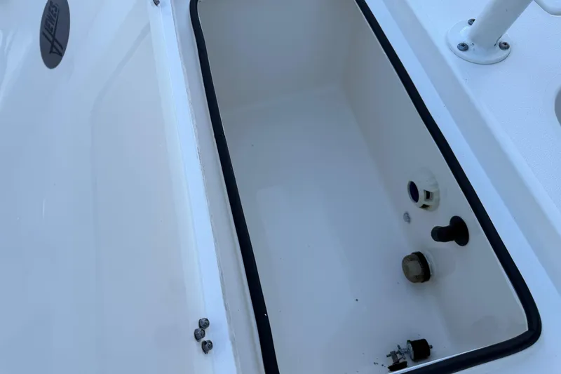 Slide: The Image of Hewes Redfisher 18 boat storage compartment, 2022 model, with drainage features. - 12