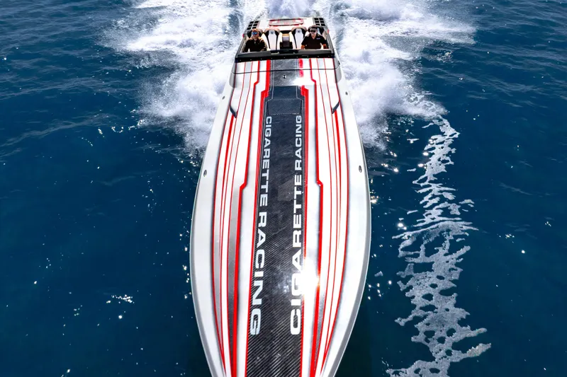 Slide: The Image of 2020 Cigarette 515 racing boat speeding on open water, top view. - 8