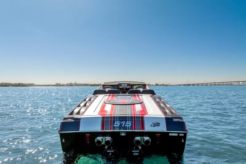 Slide: The Image of 2020 Cigarette 515 boat on water, showcasing sleek design and vibrant colors. - 9