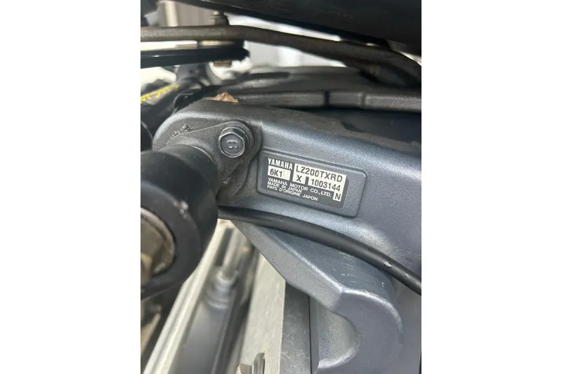 Slide: The Image of Close-up of Yamaha LZ200TXRD engine label on 2006 Triton 22 Bay Flight boat. - 30