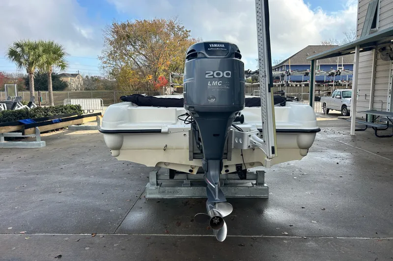 Slide: The Image of 2006 Triton 22 Bay Flight boat with Yamaha 200 LMC outboard motor. - 7
