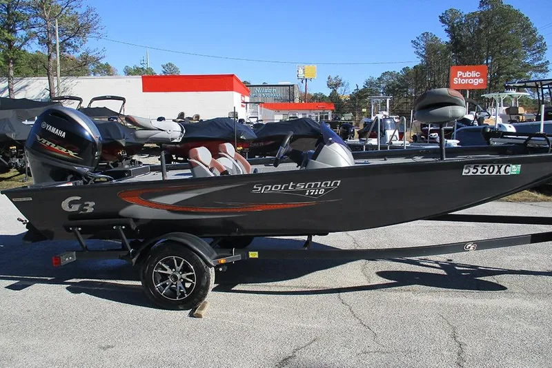 The Image of 2022 G3 Sportsman 1710 boat with Yamaha engine, parked outdoors. - 1