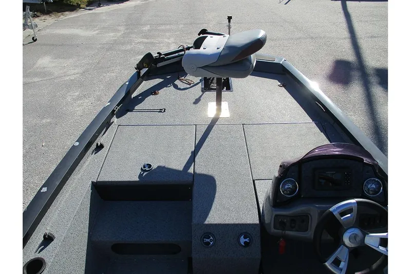 Slide: The Image of 2022 G3 Sportsman 1710 boat interior with steering wheel and seating. - 10