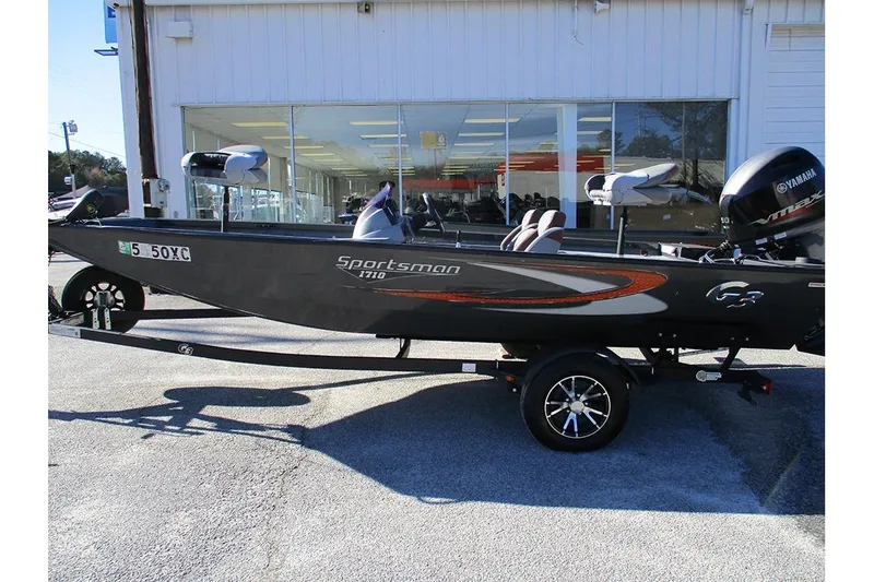 Slide: The Image of 2022 G3 Sportsman 1710 boat with Yamaha engine on trailer, parked outside dealership. - 5