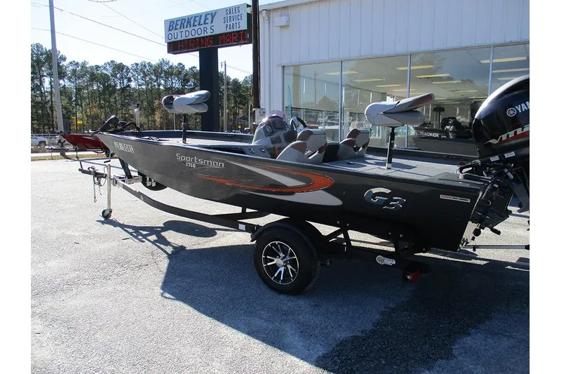 Slide: The Image of 2022 G3 Sportsman 1710 boat on trailer outside dealership. - 6