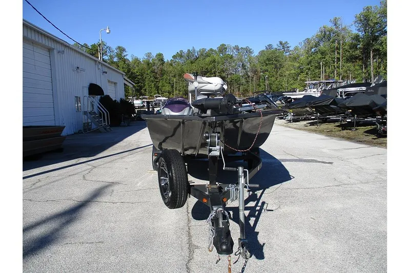 Slide: The Image of 2022 G3 Sportsman 1710 boat on trailer in outdoor storage area. - 8