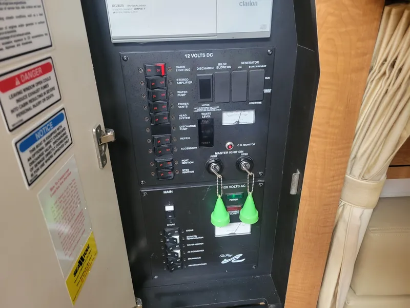 Slide: The Image of Electrical control panel of a 2006 Sea Ray 320 Sundancer boat. - 30