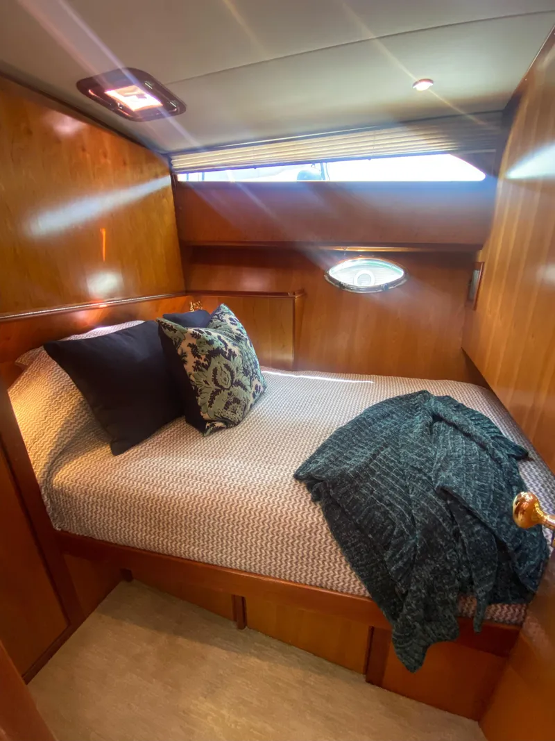 Slide: The Image of Interior of 2009 Mikelson Zeus Sportfisher with cozy bed. - 14