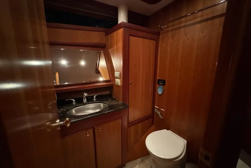 Slide: The Image of Luxurious wooden bathroom interior of 2009 Mikelson Zeus Sportfisher yacht. - 15