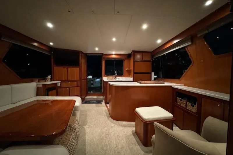 Slide: The Image of Luxurious interior of 2009 Mikelson Zeus Sportfisher yacht with elegant wood finishes and modern amenities. - 2