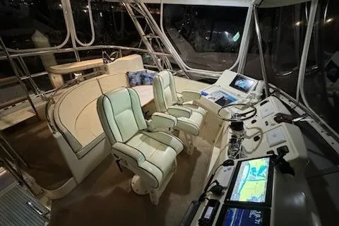 Slide: The Image of Luxurious 2009 Mikelson Zeus Sportfisher cockpit with advanced navigation systems and plush seating. - 20