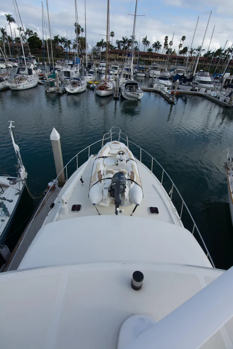 Slide: The Image of 2009 Mikelson Zeus Sportfisher docked, surrounded by sailboats. - 27
