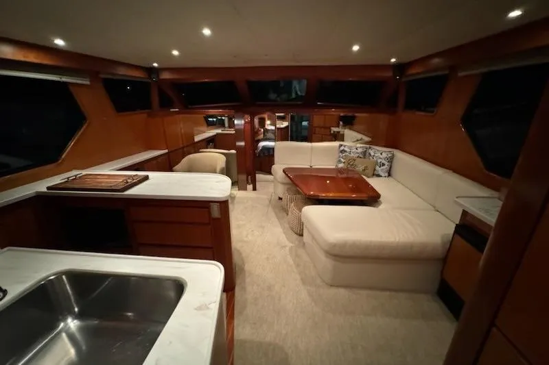 Slide: The Image of Luxurious interior of 2009 Mikelson Zeus Sportfisher yacht with elegant seating and modern amenities. - 4