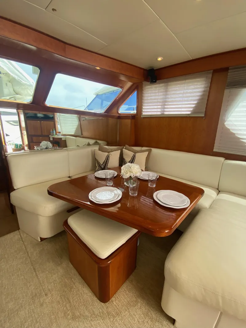 Slide: The Image of Interior of 2009 Mikelson Zeus Sportfisher with elegant seating area. - 5
