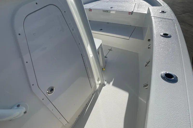 Slide: The Image of 2026 Pathfinder 2400 Open boat interior with sleek design and storage compartments. - 10