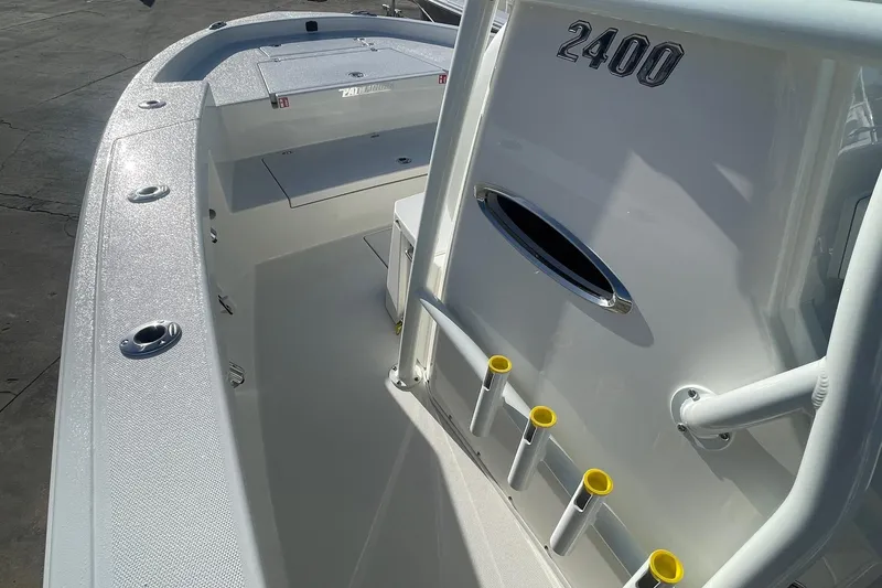 Slide: The Image of 2026 Pathfinder 2400 Open boat interior with rod holders and seating. - 11