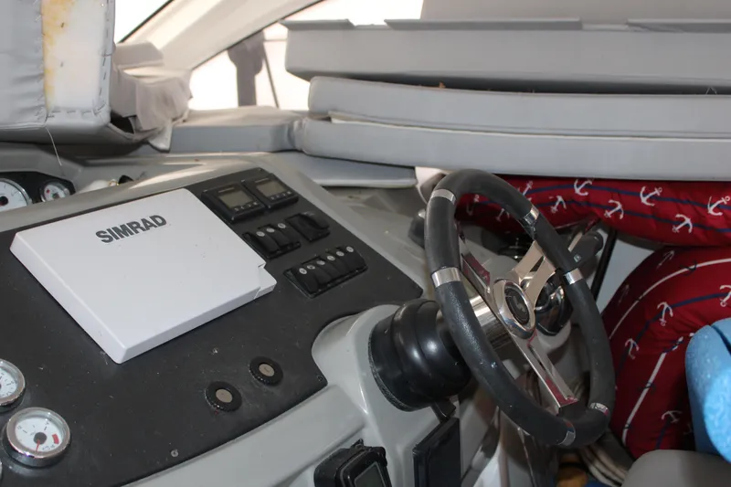 Slide: The Image of Interior helm of 2012 Beneteau Gran Turismo 38 with Simrad navigation system. - 10