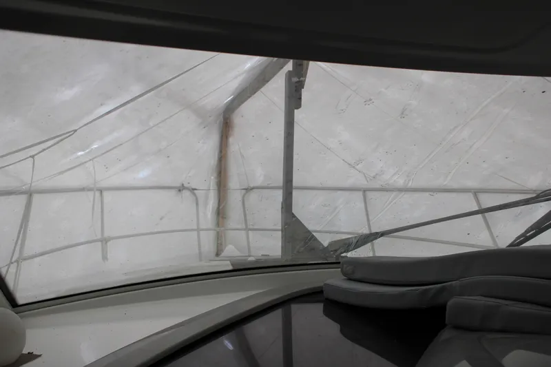 Slide: The Image of Interior view of 2012 Beneteau Gran Turismo 38 under protective cover. - 11