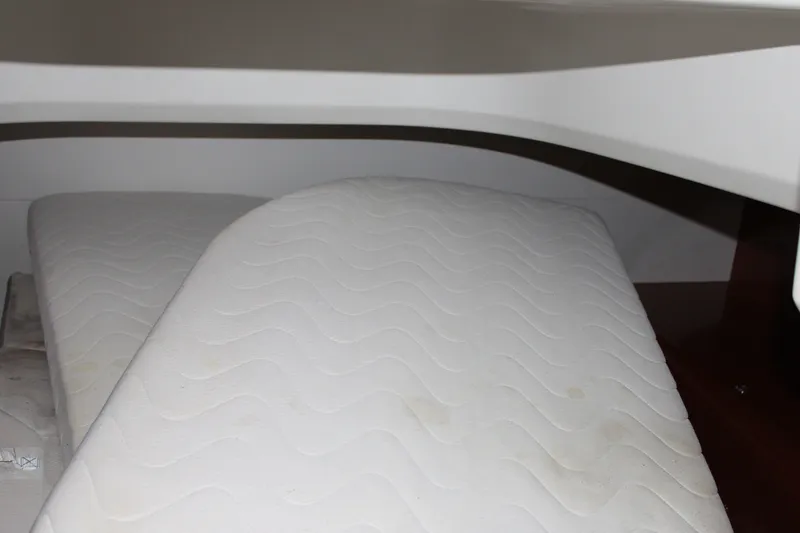 Slide: The Image of Interior cabin of 2012 Beneteau Gran Turismo 38 with twin mattresses. - 21