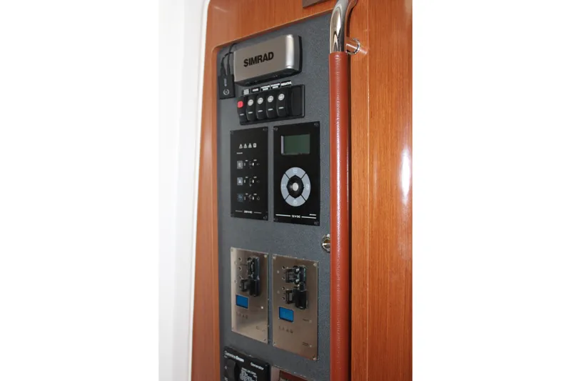 Slide: The Image of Control panel of 2012 Beneteau Gran Turismo 38 yacht with Simrad electronics. - 22