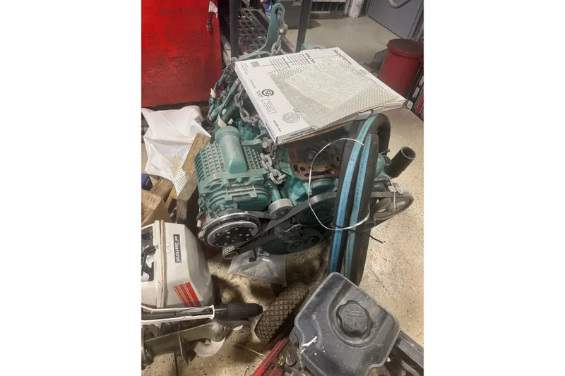 Slide: The Image of Engine of a 2012 Beneteau Gran Turismo 38 in a workshop setting. - 31