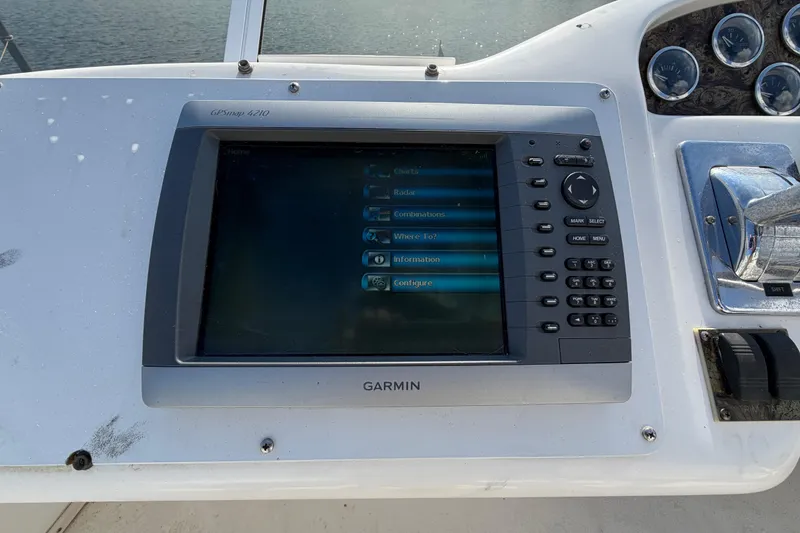 Slide: The Image of Garmin GPSmap 4210 on 1997 Sea Ray 370 Aft Cabin boat dashboard. - 28