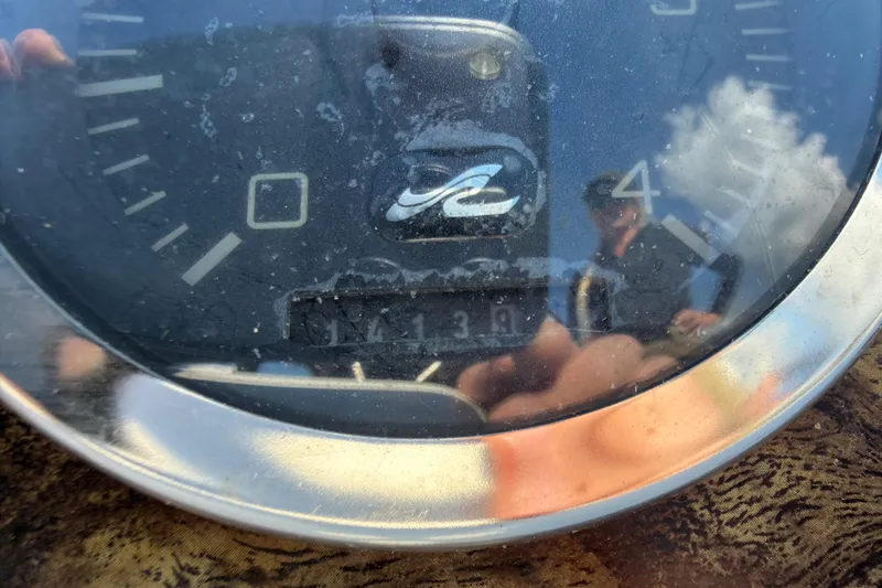 Slide: The Image of Close-up of a 1997 Sea Ray 370 Aft Cabin boat gauge with reflections. - 32