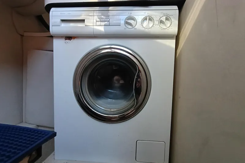 Slide: The Image of Washing machine inside 1997 Sea Ray 370 Aft Cabin yacht interior. - 81