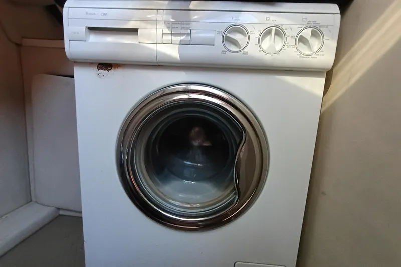 Slide: The Image of Washing machine inside 1997 Sea Ray 370 Aft Cabin yacht interior. - 82