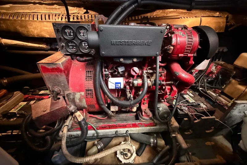 Slide: The Image of Engine room of a 1997 Sea Ray 370 Aft Cabin with Westerbeke generator. - 98