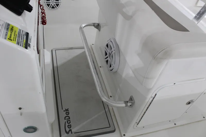 Slide: The Image of Interior of 2012 Sea Hunt Edge 24 boat with SeaDek flooring and stainless steel grab rail. - 23