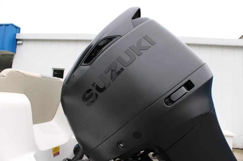 Slide: The Image of Suzuki outboard motor on a 2026 Key West 239 FS boat. - 26